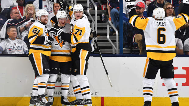 jake-guentzel-celebrate-penguing-1300.jpg